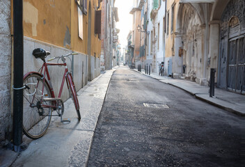 A serene street with a parked bicycle.