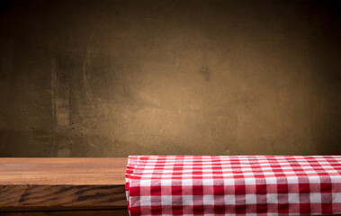 top view with red empty kitchen napkin isolated on table background. Folded cloth for mockup with copy space, Flat lay. Minimal style. High quality photo - 671633450