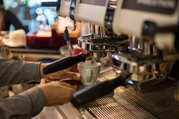 A barista Making coffee and cappuccino