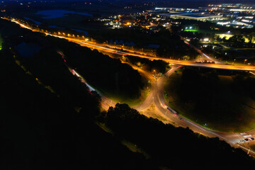 Gorgeous High Angle View of Illuminated British City at Just After Sunset