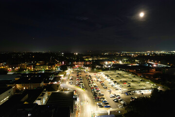 Fototapeta premium Gorgeous High Angle View of Illuminated British City at Just After Sunset