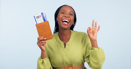 Black woman, passport and ok sign for studio portrait with airplane ticket, documents and excited...