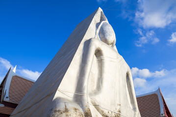Closeup big amulet Buddhism statue, famous Phra Nang Phaya, in front of the temple of Wat Nang...