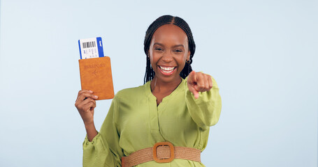 African woman, passport and studio portrait to point at you for airplane ticket, document and smile...