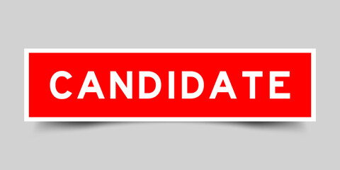 Red color square label sticker with word candidate on gray background