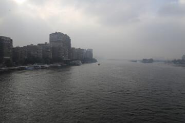 Fototapeta premium The Nile, river, fog, buildings