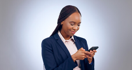 Business woman, studio and smartphone for reading notification, mobile chat and social network. Happy african worker scroll on cellphone, news app and search digital information on grey background