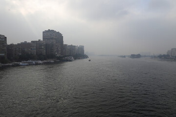 Naklejka premium The Nile, river, fog, buildings