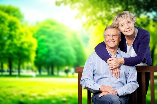 Happy active old senior couple outdoors, AI generated image