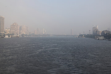 Fototapeta na wymiar The Nile, river, fog, buildings