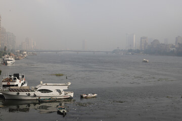 Fototapeta na wymiar The nile, river, fog, buildings