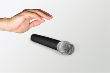 Human hand with microphone