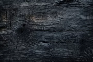 Foto op Plexiglas Charred wood texture background. Rough black surface from fire. Dark substance from coal or charcoal. © The Big L