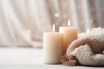Fototapeta na wymiar Winter spa ambiance with candles on a white backdrop for a cozy feel.