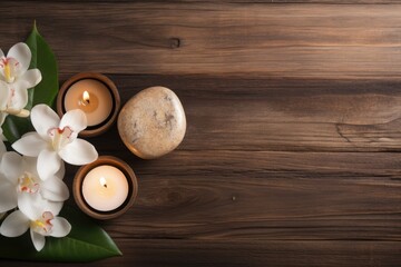 Fototapeta na wymiar Tea candle on wooden surface for spa nail care.