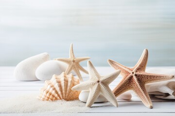 Fototapeta na wymiar Starfish and sea salt on a table made of white wood with spa stones.