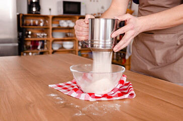 Sifting White Wheat Flour for Baking