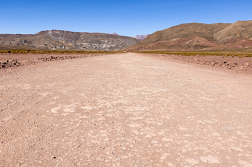 Traveling the famous Ruta40 in the scenic Argentinian highlands - fantastic views while driving through colorful and remarkably shaped mountains and watching wildlife in high altitude in South America