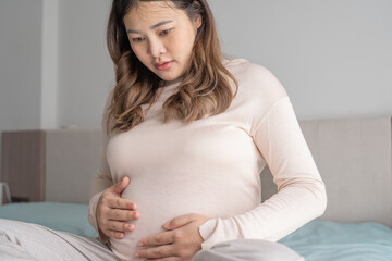 worried pregnant woman concerned and anxious woman in pregnancy overthinking worrying about pregnancy problem Pregnancy depression Mental health