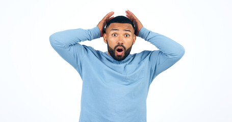 Naklejka premium Shock, emoji and portrait of man in a studio with wow, omg or wtf facial expression for news. Amazing, surprise and face of young ale person from Colombia with crazy face isolated by white background
