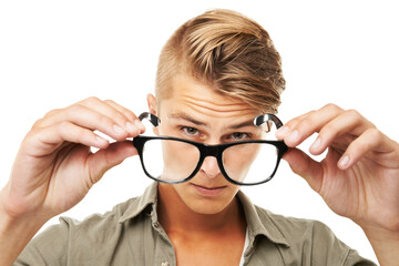 Perspective, portrait and a man with glasses on a white background for vision, eye care or test....