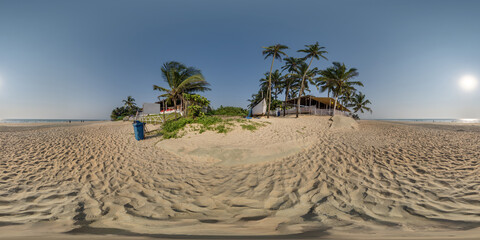 360 hdri panorama with coconut trees on ocean coast near tropical shack or open air cafe on beach...