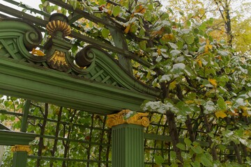        St. Petersburg, Russia, October 28, 2023. Fragment of a carved wooden fence in the Summer...