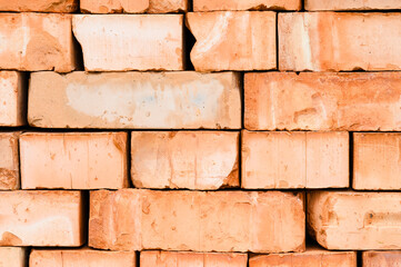 Obraz premium Textured background of stacked bricks