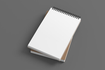Notebook mockup. Two notebooks in a stack. Spiral notepad on gray background