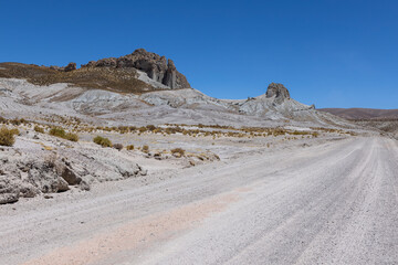 Traveling the famous Ruta40 in the scenic Argentinian highlands - fantastic views while driving through colorful and remarkably shaped mountains and watching wildlife in high altitude in South America