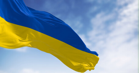 Close-up of Ukraine national flag waving on a clear day