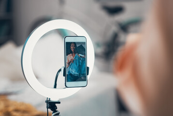 Fashion Influencer with ring light, tripod and phone recording style review vlog, video and photo...