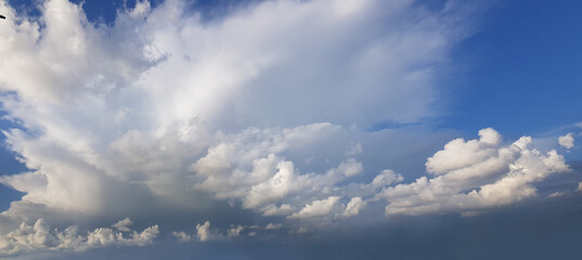 Blue panoramic sky with white cloud on a sunny day, nature background