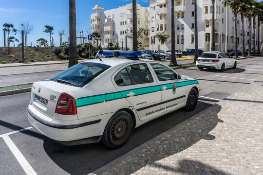 A Police car of the Guarda Nacional Republicans on the street in Quarteira, Portugal.