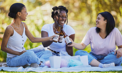Black women, picnic and beer toast in park, nature environment or sustainability garden with food, popcorn or cotton candy. Smile, happy friends or bonding students with alcohol in celebration social - obrazy, fototapety, plakaty