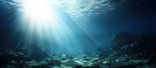 Deep blue sunlit abyss beneath the sea