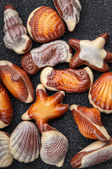 seashell candy chocolate sweet seashells dessert eating meal food snack on the table copy space food background rustic top view