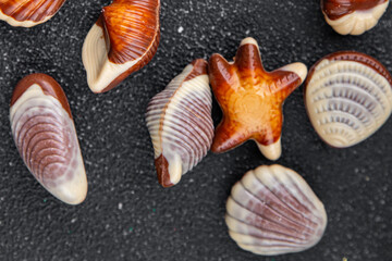 seashell candy chocolate sweet seashells dessert eating meal food snack on the table copy space food background rustic top view