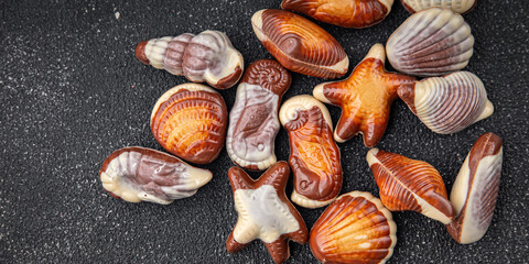 seashell candy chocolate sweet seashells dessert eating meal food snack on the table copy space food background rustic top view