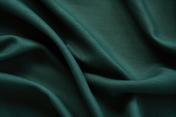 Obraz premium A close-up view of a dark green fabric. This versatile image can be used in various design projects