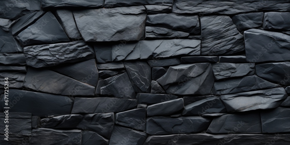 Poster A detailed close-up shot of a black stone wall. Perfect for adding texture and depth to any design project