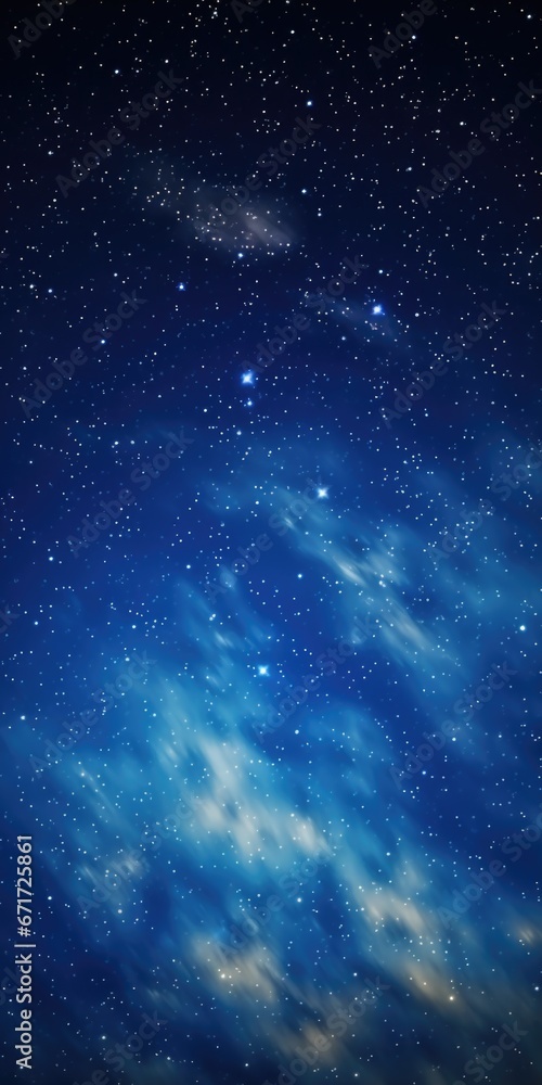 Poster a captivating image of a night sky filled with stars and wispy clouds. this picture can be used to d