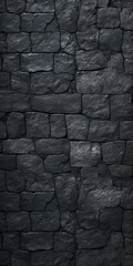 A close-up image of a black stone wall. This versatile texture can be used for various design projects