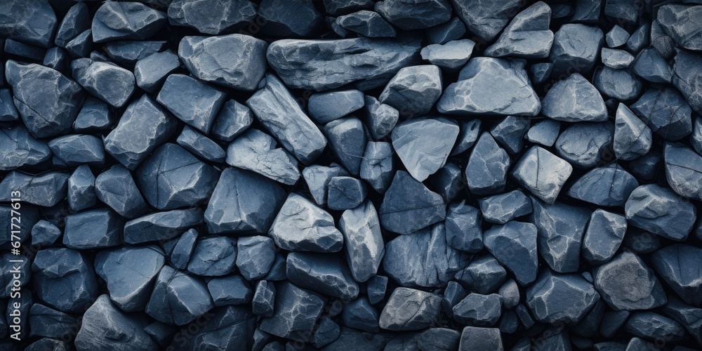 Aufkleber A pile of rocks on a black background. This image can be used for various projects and designs.