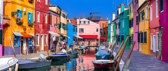 Foto op Canvas Italy travel and landmarks. Most colorful places (towns) - Burano island, village with vivid houses near Venice. © Freesurf