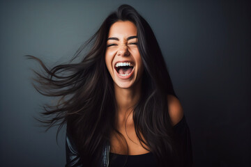 Dynamically laughing woman portrait
