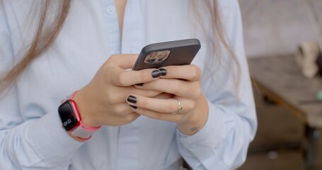 Close up hands using smartphone. Checking Social Apps. Checking bank accounts, making payments, or managing finances through banking apps. Scheduling appointments, setting reminders in calendars. 