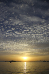 sunset on the beach. Seaside town of Turgutreis and spectacular sunsets. Selective Focus.
