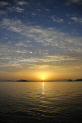 sunset on the beach. Seaside town of Turgutreis and spectacular sunsets. Selective Focus.