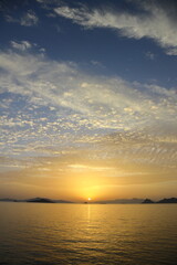 sunset on the beach. Seaside town of Turgutreis and spectacular sunsets. Selective Focus.